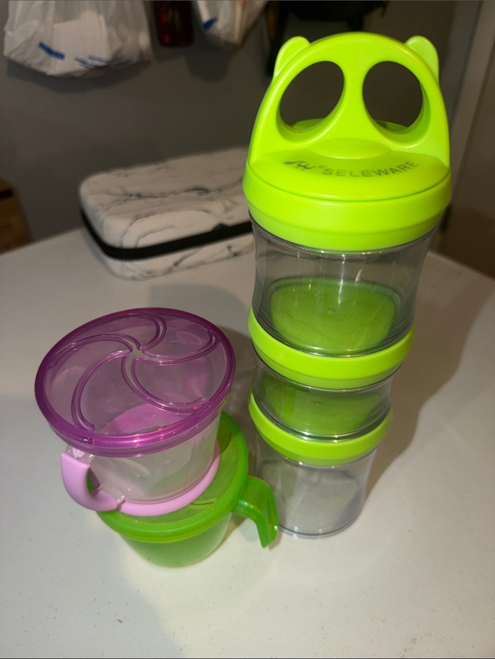 Munchkin Stackable Snack & Portion Containers in Neon Green and Purple